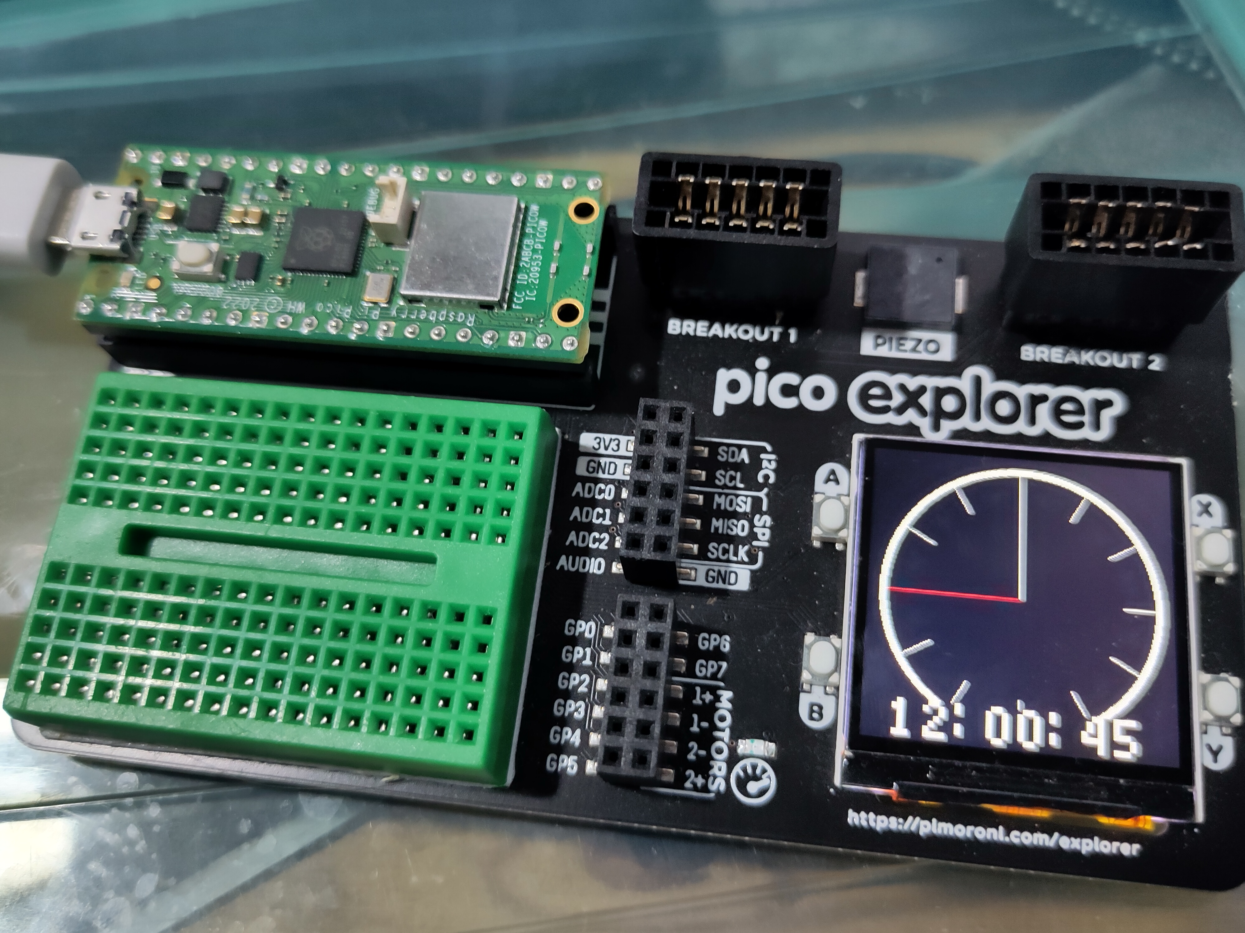 Clock running on the Pico Explorer Base with an original Pi Pico.